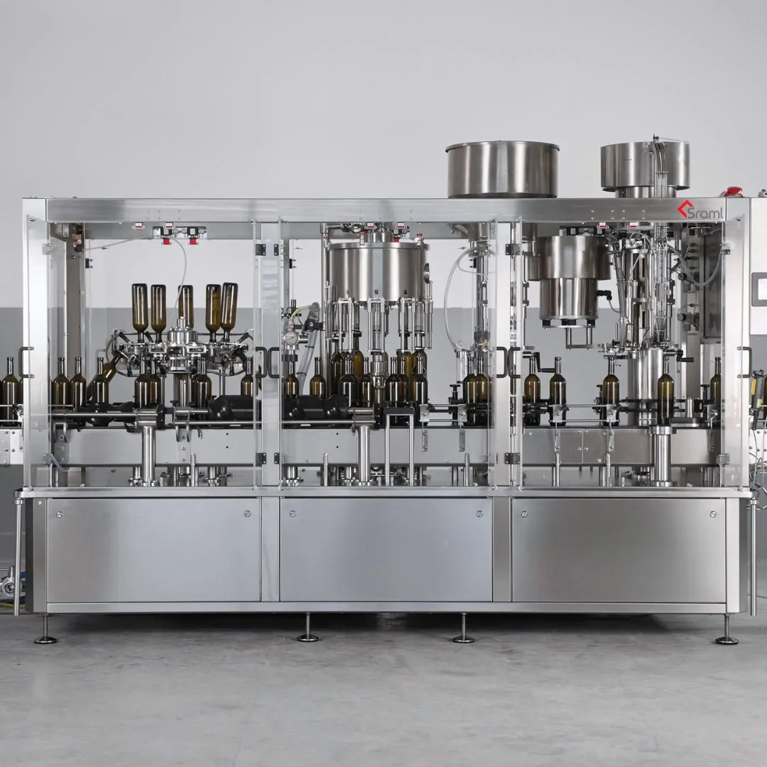 SRAML Automated Wine filling monoblock - the monoblock system combines multiple tasks in the bottling process within a single unit, offering space and labor efficiency, energy optimization, and seamless synchronization.